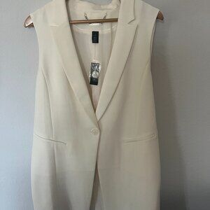 Sleeveless tunic jacket